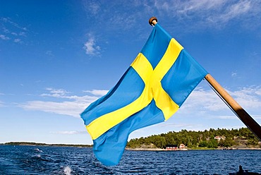 Swedish flag on a ferry, Stockholm archipelago, Sweden