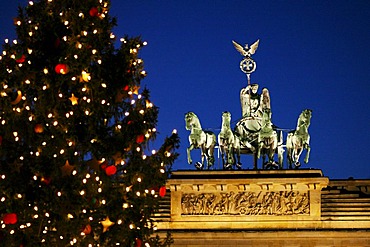 Brandenburger Tor Brandenburg gate with Quadriga with christmas tree Berlin Germany