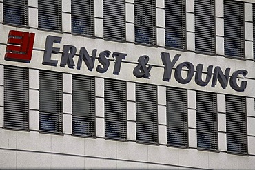 Ernst & Young company sign on a office building