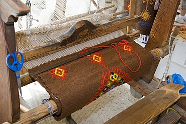 A weaving loom with a carpet on it, Crete, Greece