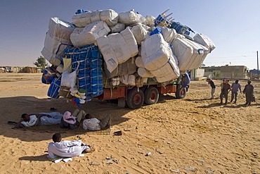 Totally overloaded truck at the oasis of Kufra, Kufrah, Al Kufrah, Libya