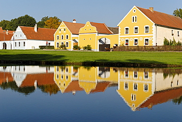 Village square with fire pond of Zabori, south Bohemia, Czech Republic