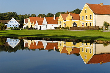 Village square with fire pond of Zabori, south Bohemia, Czech Republic