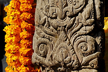 Carved wooden coloumn with flower decoration, Patan, Kathmandu, Nepal