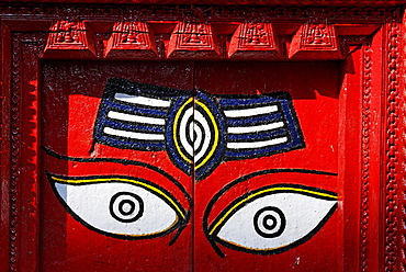 Buddha eyes on a painted door, Kathmandu, Nepal