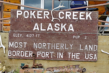 Poker Creek sign on the border between Yukon and Alaska, USA