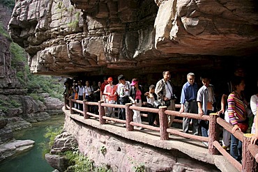 Group of people hiking, valley near Jiaozou, Yuntai Mountain, China