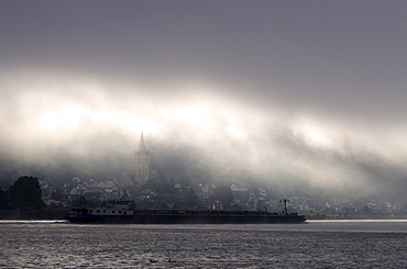 Container ship in fog, Rhine River, Lorch, Rhineland-Palatinate, Germany, Europe