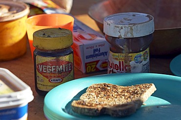 Vegemite, nutella and toast on the breakfast table