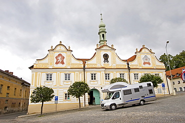 Campmobile in front of the town hall, Kasperske Hory, Czech Republic, Europe