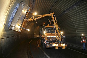 A special-purpose-vehicle is cleaning the walls of the Glockenberg-tunnel. Koblenz, Rhineland-Palatinate, germany