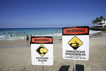 Warning sign at the White Sands Beach in Kailua Kona, Hawaii USA