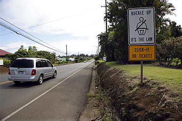 Traffic sign safety seat belt on a street on Big Island, Hawaii, USA