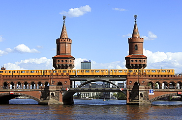 Tube U1 on the Oberbaumbruecke Bridge crossing Berlin Spree River in Friedrichshain-Kreuzberg, Berlin, Germany, Europe