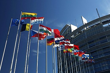 Flag poles with flags of the European Union countries blow before the building of the European parliament in Strasbourg, France