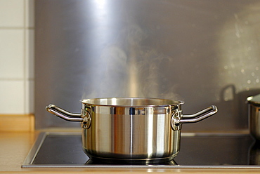 Steam rising out of cooking pot