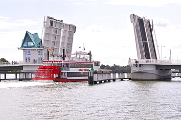 Paddle steamer on the Schlei inlet passing through the bascule bridge at the port in Kappeln, Schleswig-Holstein, Northern Germany, Germany, Europe