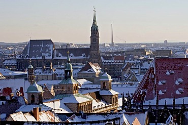 View from the castle over the snow-covered roofs of the city, direction old townhall and St.Lorenzchurch Nuremberg, Bavaria, Germany