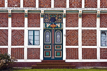 Historic timber-framed house, ornate entrance door, detail, old farmhouse, Neuenfelde, Altes Land area, fruit cultivation, Harburg district, Hamburg, Germany, Europe