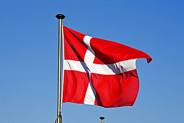 Danish Flag, Flag of Denmark, Dannebrog, fluttering in the wind on a flagpole