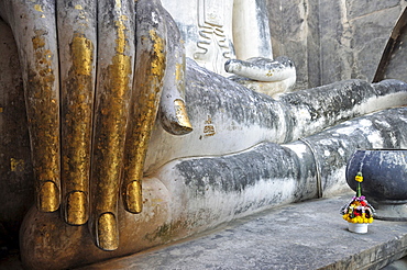 Gold leaf hand of a Buddha statue, Wat Si Chum, Sukhothai Historical Park, Sukhothai, Thailand, Southeast Asia, Asia