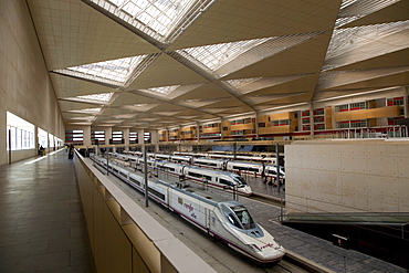 AVE high-speed train of the Spanish rail company Renfe in the Zaragoza-Delicias railway station, Zaragoza, Saragossa, Aragon, Spain