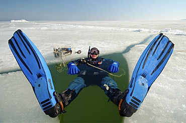 Preparations for subglacial diving, ice diving in the frozen Black Sea, a rare phenomenon which last occured in 1977, Odessa, Ukraine, Eastern Europe