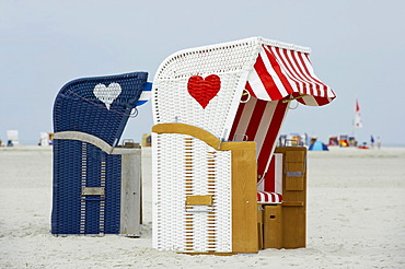 Roofed wicker beach chairs with hearts, Kniepsand at Norddorf, Amrum, North Frisia, Schleswig-Holstein, Germany, Europe