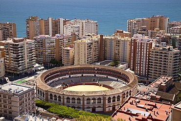 View from Monte de Gibralfaro over a bullring surrounded by skyscrapers, MâˆšÂ°laga, Andalucia, Spain, Europe, PublicGround