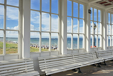 Looking through the window of the pavilion of the Kurhaus spa building towards the Baltic Sea and the beach, Baltic Sea resort town of Binz, Binz, RâˆšÂºgen, Mecklenburg-Western Pomerania, Germany