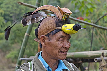 Father of the bridegroom with his traditional decoration at his son's wedding ceremony in Peni village, Arunachal Pradesh, India, Asia