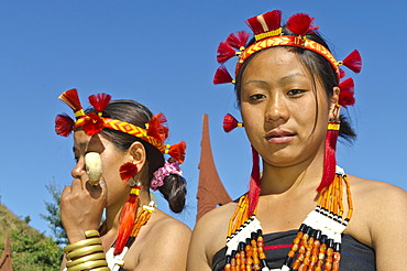 Women of the Samdom tribe with traditional headdress at the annual Hornbill Festival, Kohima, Nagaland, India, Asia