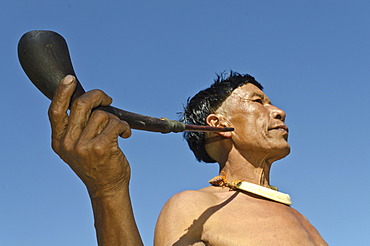 Man of the Samdom tribe with a pipe, at the annual Hornbill Festival, Kohima, Nagaland, India, Asia