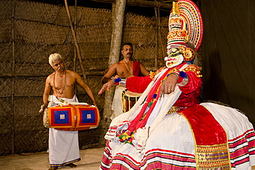 The Kathakali character Ravana on stage at Kolornagerkavu-Mandir in Perratil, Kerala, India, Asia