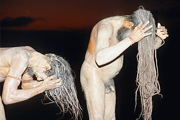 Sadhus preparing their hair for Shivratri, Varanasi, Uttar Pradesh, India, Asia