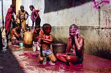 Visitors trying to clean themselves after the celebrations of Holi festival, Vrindaban, Uttar Pradesh, India, Asia