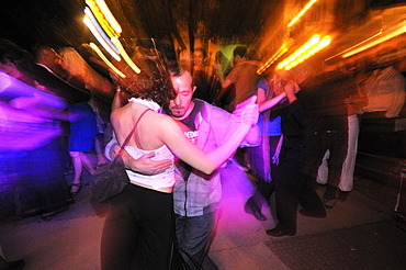 Dancing couples at a Milonga, tango event on the Plaza Dorrego square in the traditional San Telmo neighbourhood, Buenos Aires, Argentina, South America