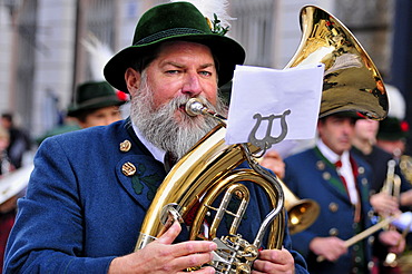 Musician in garb at the Oktoberfest\'s traditional costume procession, Munich, Bavaria, Germany, Europe