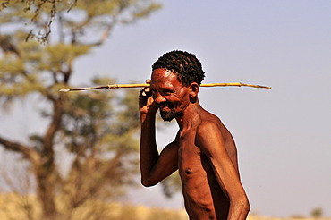 Man of the Khomani-San tribe in the Kalahari with a spear, South Africa, Africa