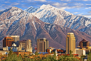 Skyline of downtown Salt Lake City with the towering Wasatch Mountain range at back, Utah, USA