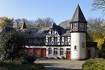 Schloss Eller castle, half-timbered building and tower in the husbandry yard, Duesseldorf, North Rhine-Westphalia, Germany, Europe