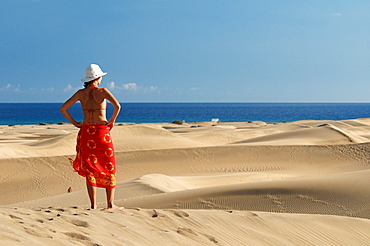 Woman in the sand dunes of Maspalomas, Gran Canaria, Canary Islands, Spain, Europe