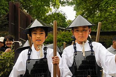 Children wearing clothing from the Heian Period at the Shintoistic horse race in the Kamigamo Shrine, Kyoto, Japan