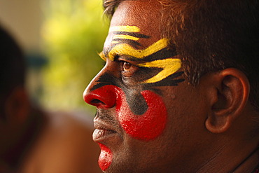 Kathakali dancer with half-finished make up, Chuvanna Thaadi mask, Kerala, southern India, Asia