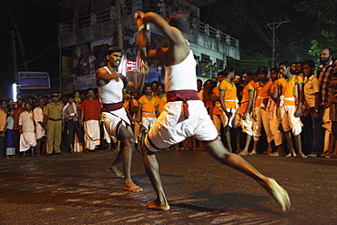 Martial arts demonstration, temple festival in Pulinkudi, Kerala state, India, Asia