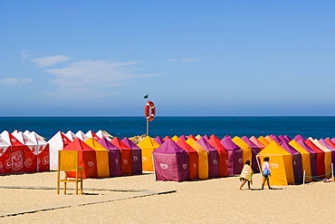 Beach with beach tents, Praia da Nazare, Nazare, Oeste, Leiria District, Portugal, Europe