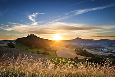 Sunset over the Hegau volcanoes Maegdeberg, on the left, and Hohenhewen on the right, Baden-Wuerttemberg, Germany, Europe