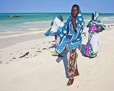 Muslim women on the beach in Zanzibar, Tanzania, Africa