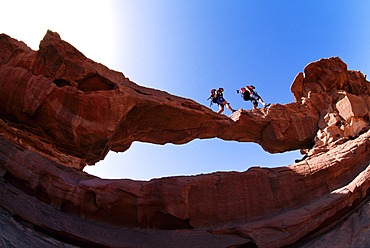 Trekking, stone arch, Wadi Rum, Jordan, Asia