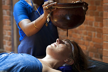 Shirodhara, Ayurvedic treatment, oil is gently poured over the forehead, Somatheeram Ayurvedic Health Resort, Chowara, Malabar Coast, South India, India, Asia